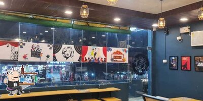 Take a seat at one of the tables at Burger Beans