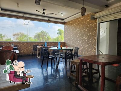 Take a seat at one of the tables at Tharavad Kitchen