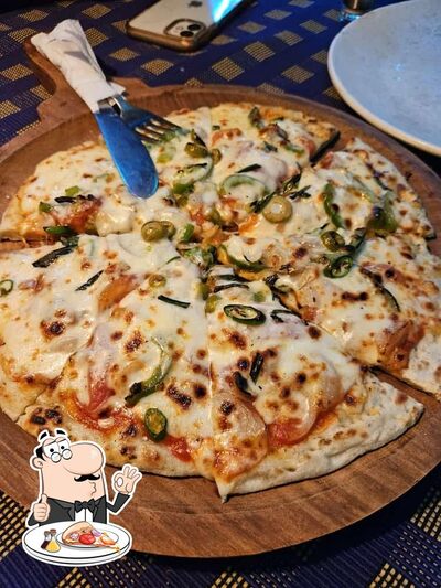 At GREENSTONE RESORT Hampi, you can order pizza
