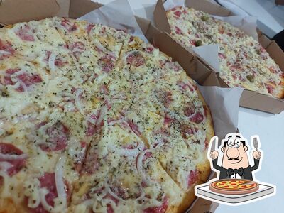 Peça pizza no À Praça Pizzaria