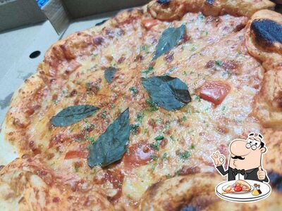 Get pizza at Curry Castle