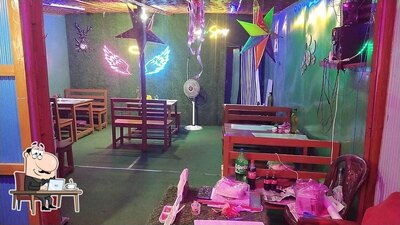 Take a seat at one of the tables at Indian spices