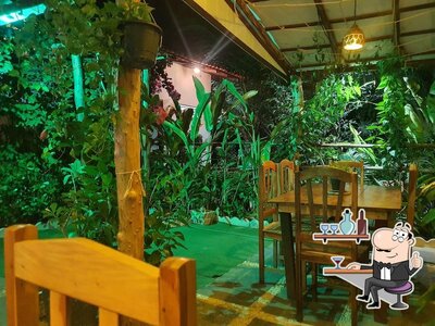 O interior do Delícias E Café