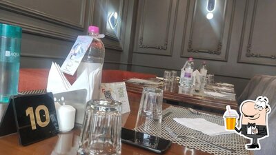 Enjoy a beverage at Olive Tree Fine Dining Restaurant