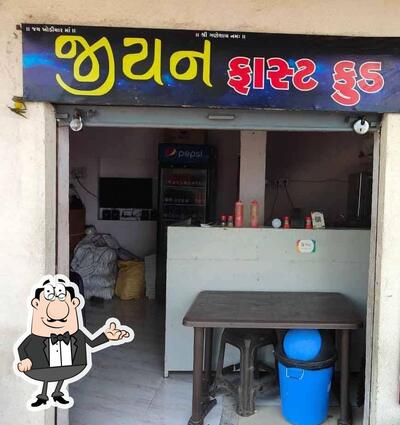 Take a seat at one of the tables at Jiyan Fast Food
