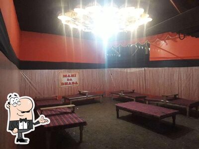 Take a seat at one of the tables at Mahi Da Dhaba