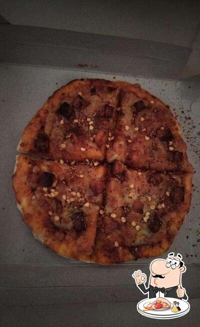 Get pizza at Waffi Caffi