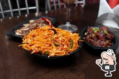 Take a seat at one of the tables at Sujay Kitchen