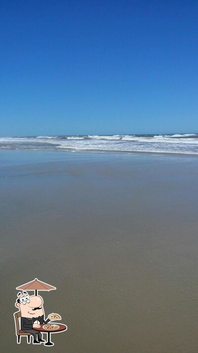 Você pode espairecer no na área externa do Praia Azul