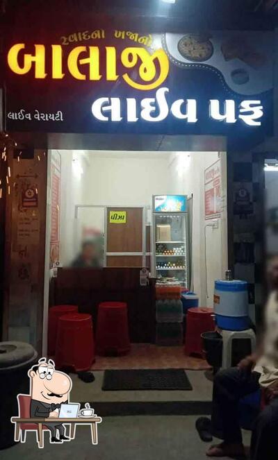 The interior of Balaji Puff & Pizza