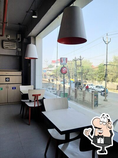 Take a seat at one of the tables at KFC