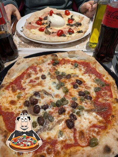 A Néné & Carmelo, vous pouvez déguster des pizzas