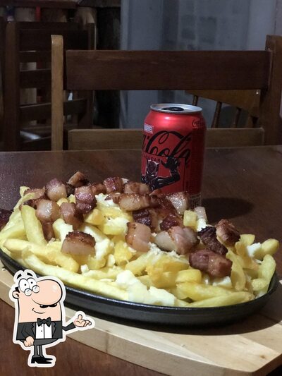 Sente em uma das mesas no Agrovilla Restaurante