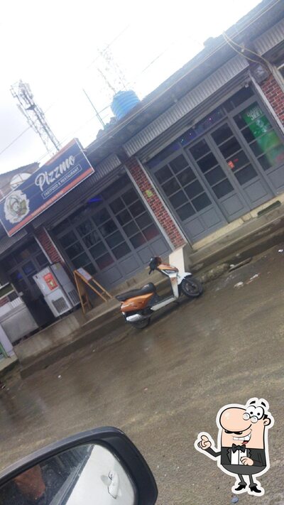 Enjoy the view outside Pizzmo (fastfood & Restaurant)