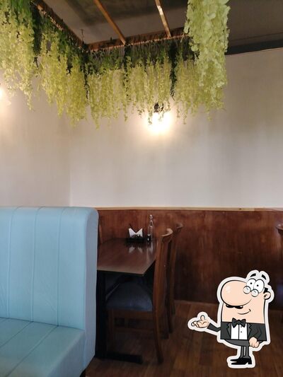 Take a seat at one of the tables at MT Kitchen