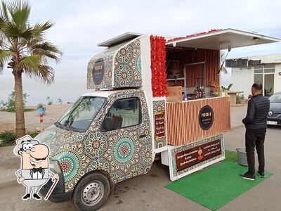 Découvrez la zone extérieure de Karzan SunSet coffee