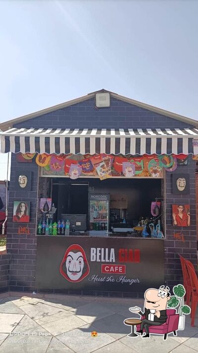 Take a seat at one of the tables at Bella Ciao Cafe
