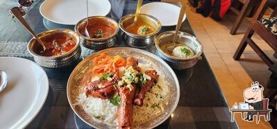 The interior of Stream Restaurant Best Restaurant On Dal Lake INDIAN AND AUTHENTIC KASHMIRI WAZWAN