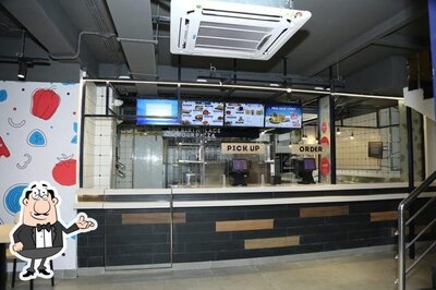 Take a seat at one of the tables at Domino's Pizza Nandyala, Kurnool