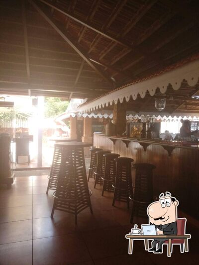Take a seat at one of the tables at The Margarita Lounge