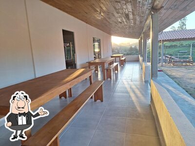 O interior do Bar e Arena Damiao