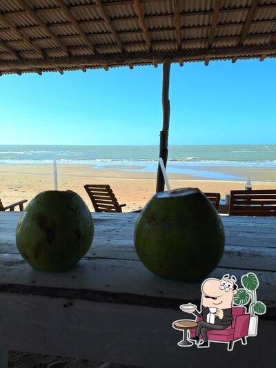 Sente em uma das mesas no Restaurante o Gonzaga