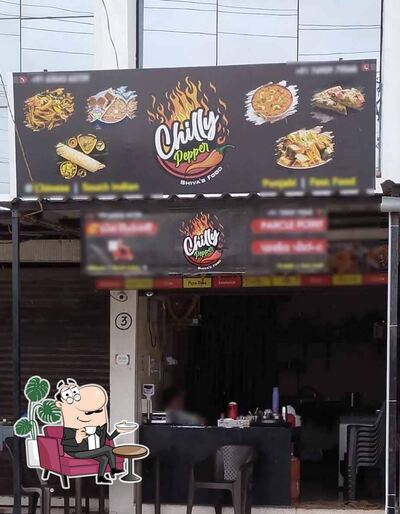 Take a seat at one of the tables at Chilly Pepper Shiva's Food