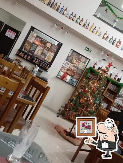 O interior do Tonny Pizzaria
