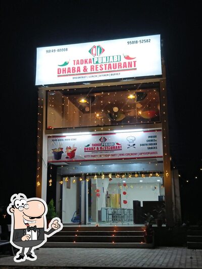 Take a seat at one of the tables at Tadka punjabi dhaba