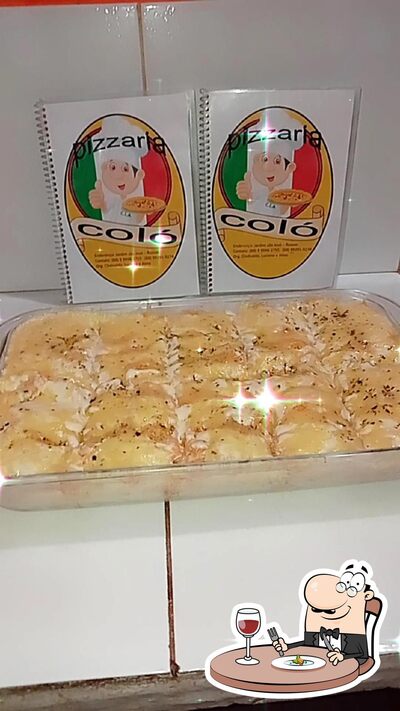 Comida em Pizzaria do irmão Coló