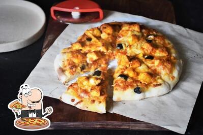 At Zayka Fast Food, you can try pizza