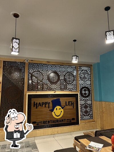 Take a seat at one of the tables at HAPPY LEH