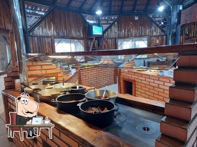 O interior do Restaurante Panela de Ferro