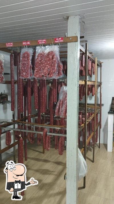 Sente em uma das mesas no Queima Rosca