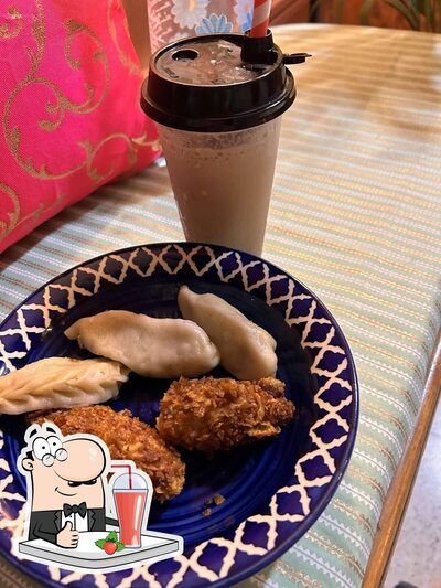 Enjoy a beverage at Momo Genie