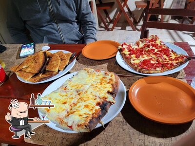 O interior do Pizzeria Morales