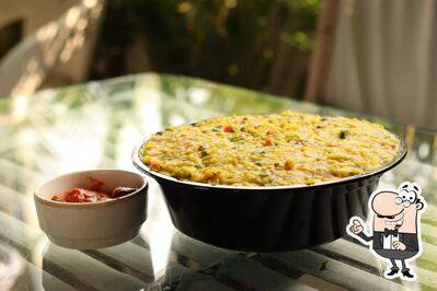 Take a seat at one of the tables at Khichdi Kitchen