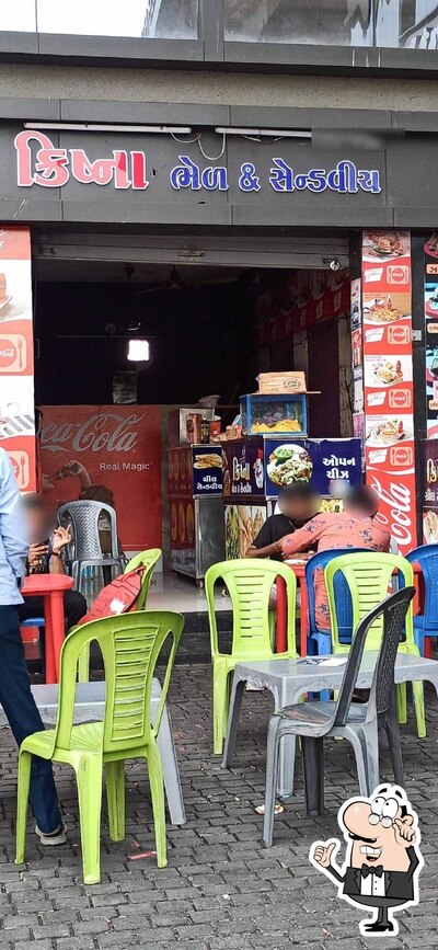 Take a seat at one of the tables at Krishna Sendwich
