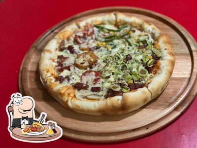 No Mama Mia Pizzas e Lanches, você pode provar pizza