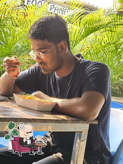 Take a seat at one of the tables at Food Panda