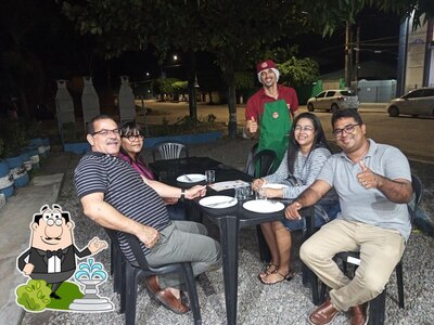 Desfrute da vista da área externa do À Praça Pizzaria