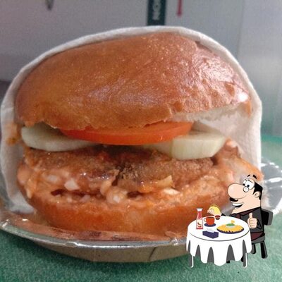 Get a burger at Neema Momo Corner