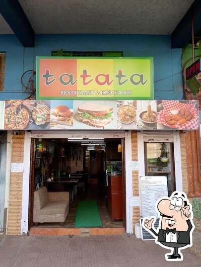 Take a seat at one of the tables at Tatata