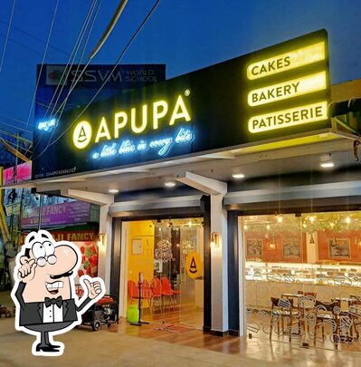 Take a seat at one of the tables at Apupa