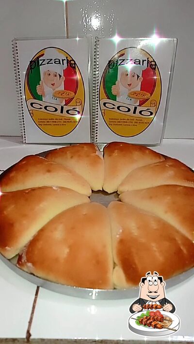 Comida em Pizzaria do irmão Coló