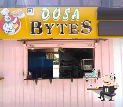 Take a seat at one of the tables at Dosa Bytes