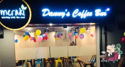 Take a seat at one of the tables at Meraki Danny's Coffee Bar