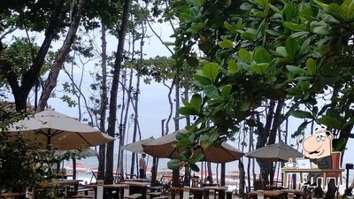 Sente em uma das mesas no Bruzy Restaurante