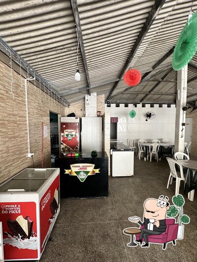 O interior do Pizzaria e Lanchonete do Roque