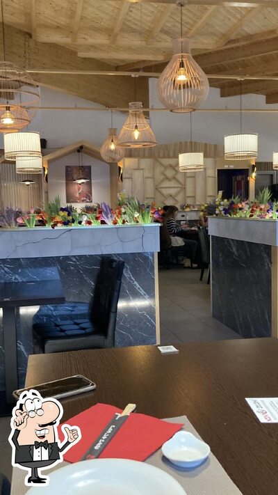 Siediti a un tavolo di Xingchen Sushi